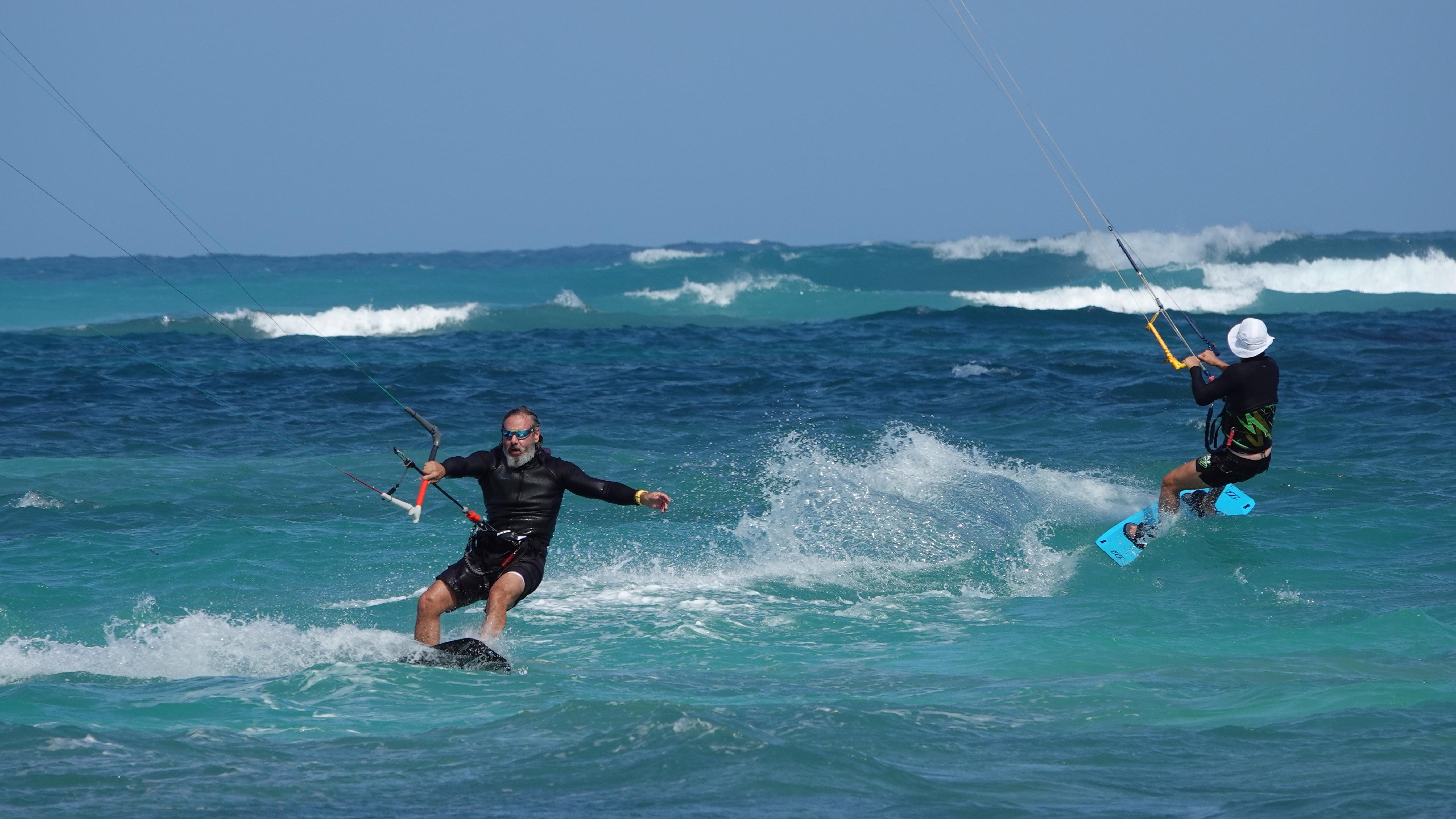 Dynamic action shot of Benny and Izzy creating big splashes